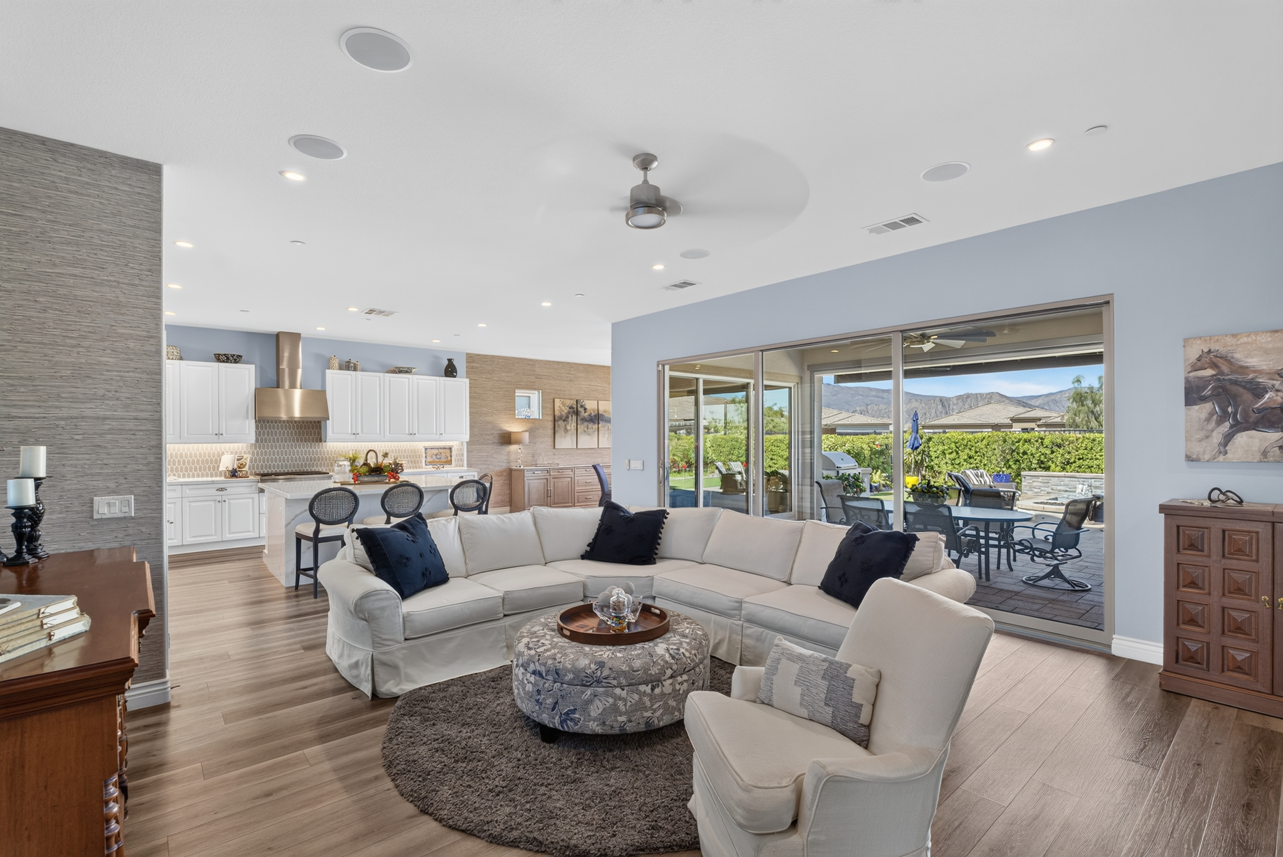 Light-filled living room opening toward mountain views